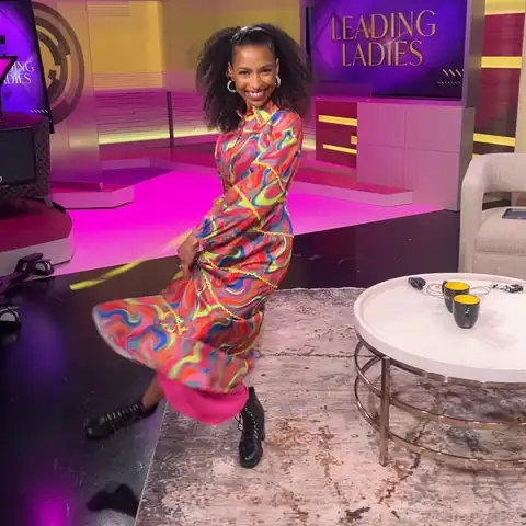 Looping clip: Chelsea twirling on the Leading Ladies studio set