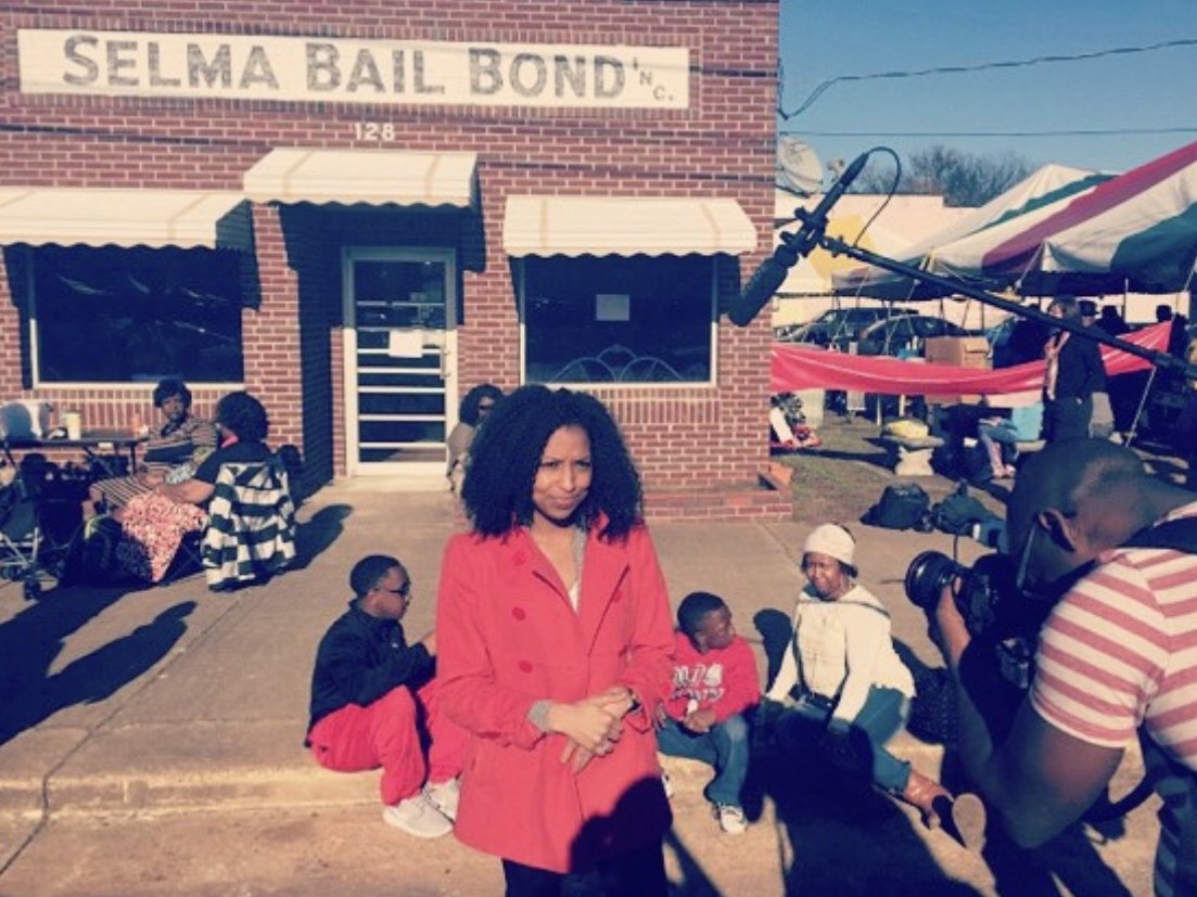 Chelsea on location in Selma, Alabama with a camera crew