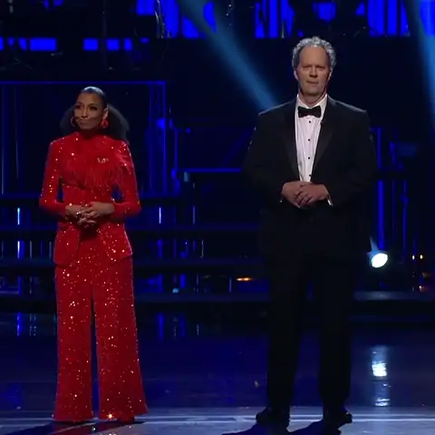 Looping clip: Chelsea and her co-host take a bow on stage during the live Shuler Awards broadcast